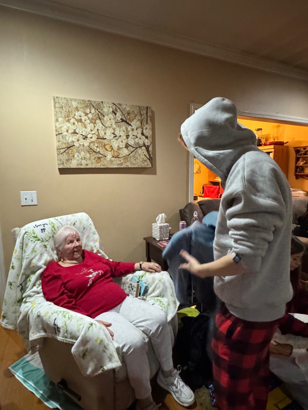 Jerilyn laughing with family during the holidays