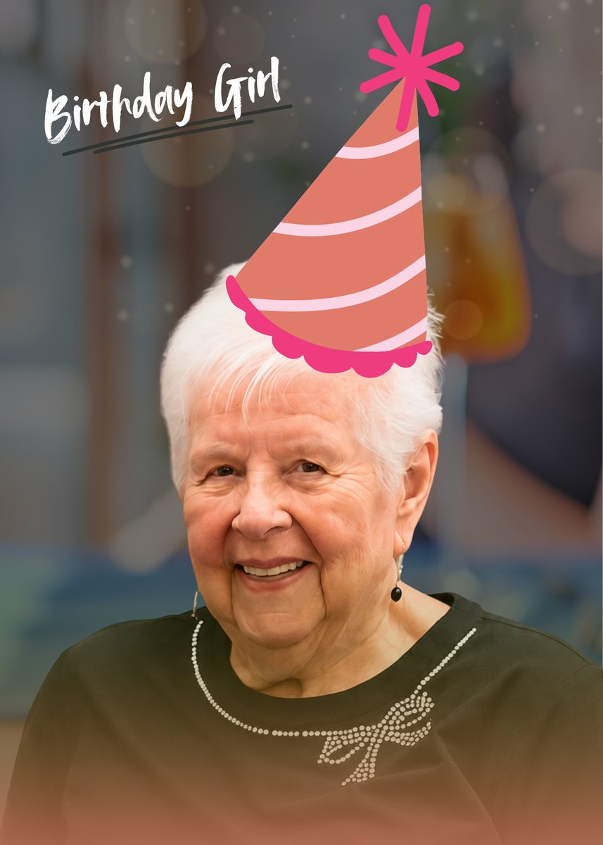 Jerilyn smiling in a birthday hat